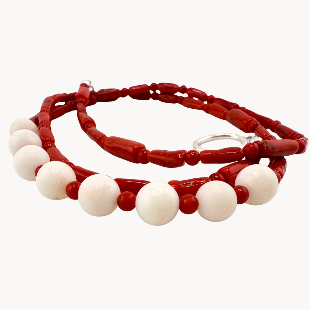 Angel Skin Coral, Coral, and Sterling Silver Necklace closeup on white background