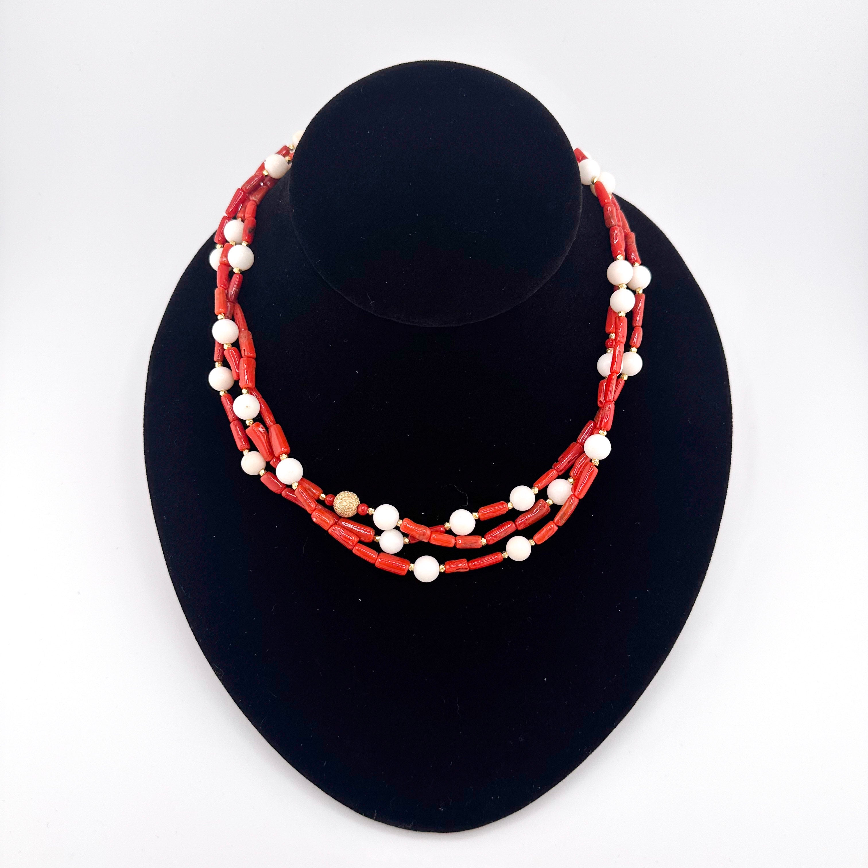 Angel Skin Coral, Coral, and 22K Gold Vermeil 3-strand Necklace on black bust