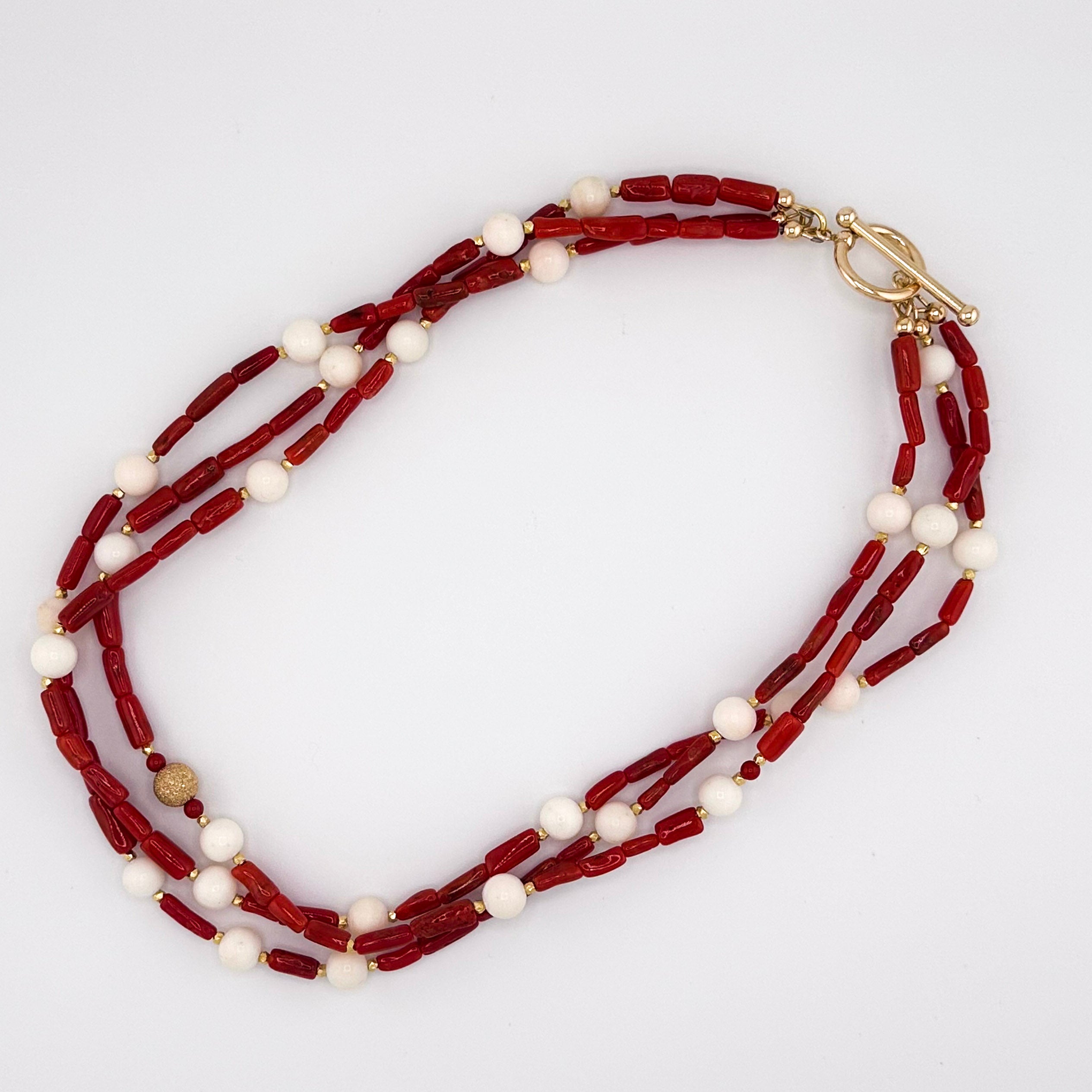 Angel Skin Coral, Coral, and 22K Gold Vermeil Necklace flatlay on white background