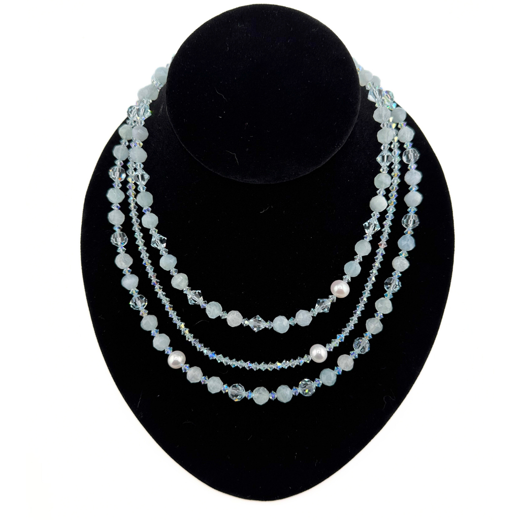 Aquamarine, Pearl, Swarovski Crystal, and Sterling Silver Necklace on black bust