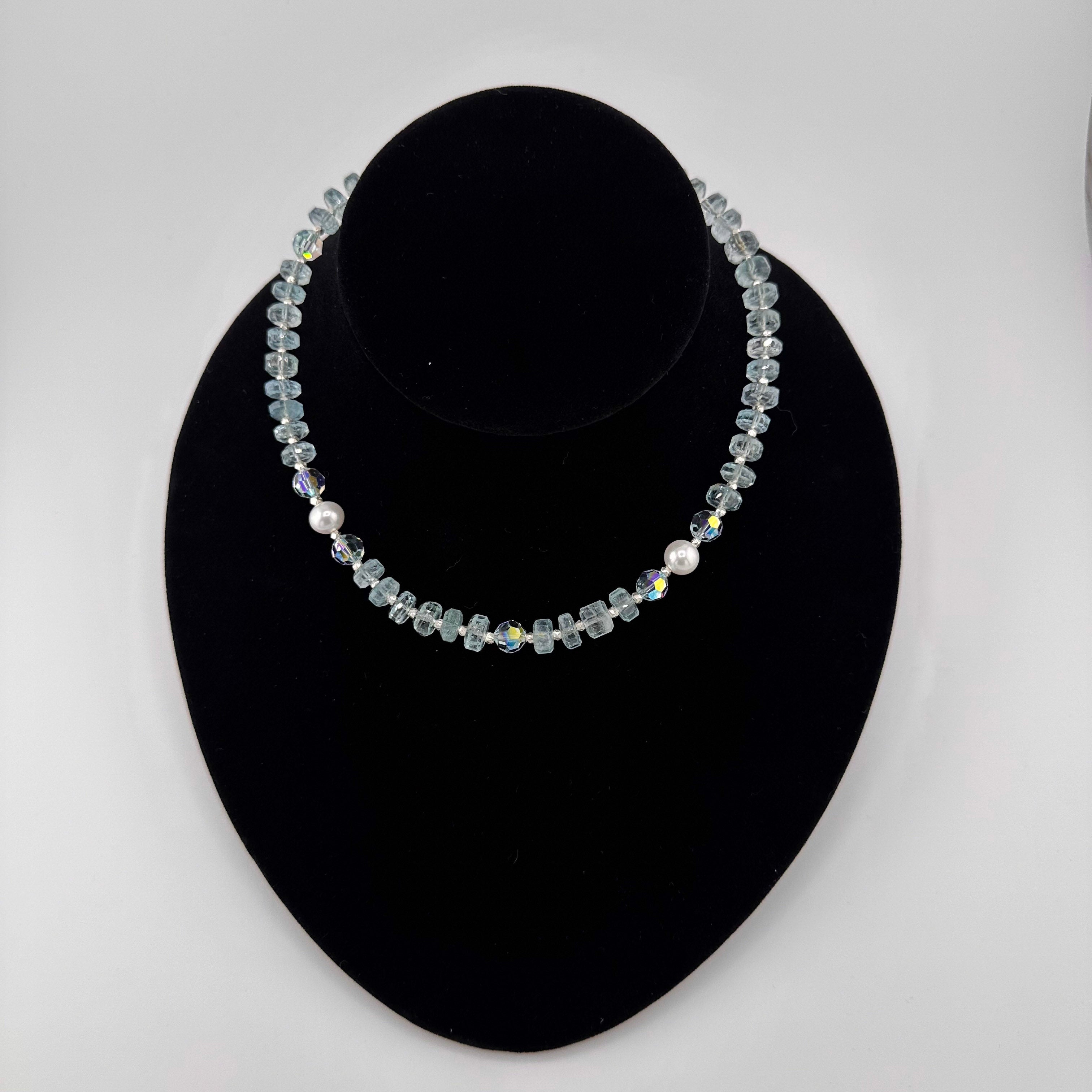 Aquamarine, Pearl, Swarovski Crystal, and Sterling Silver Necklace on black bust