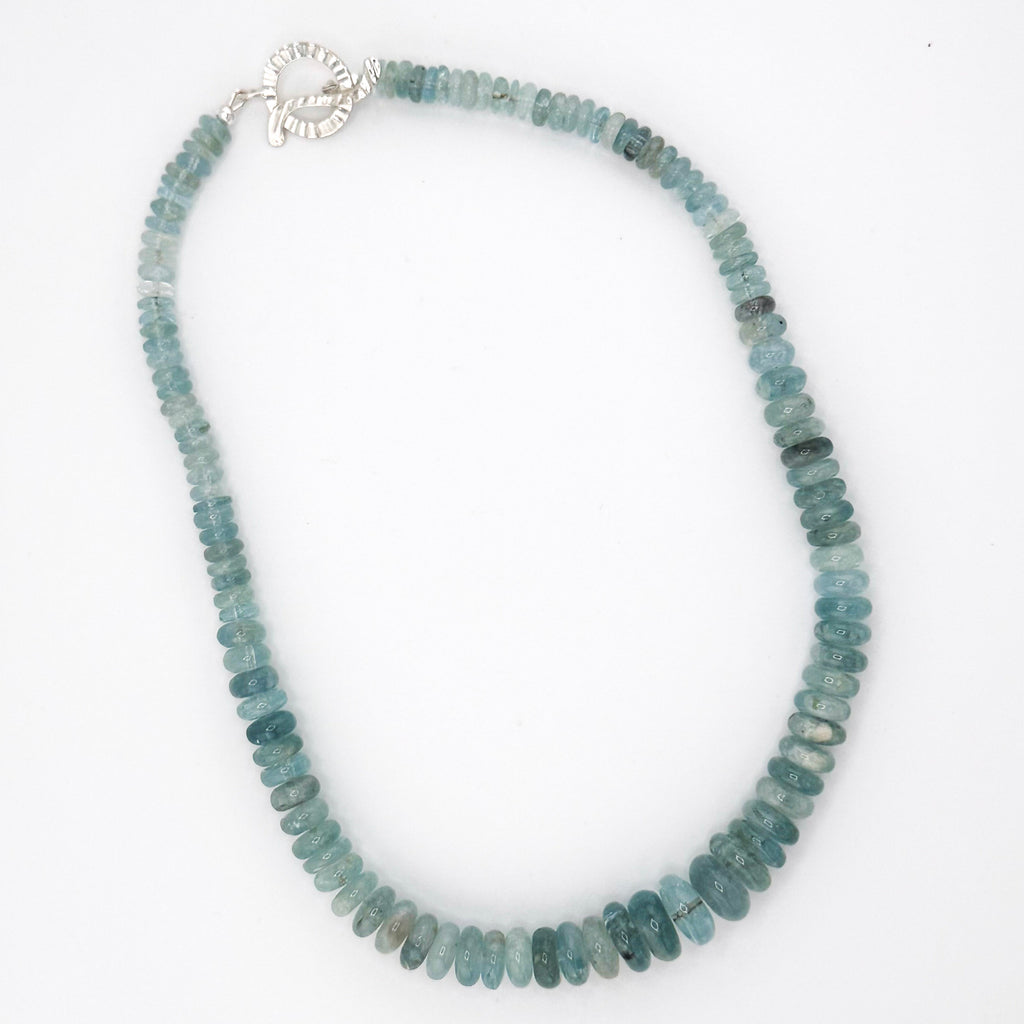 Aquamarine and Sterling Silver Necklace flatlay on white background