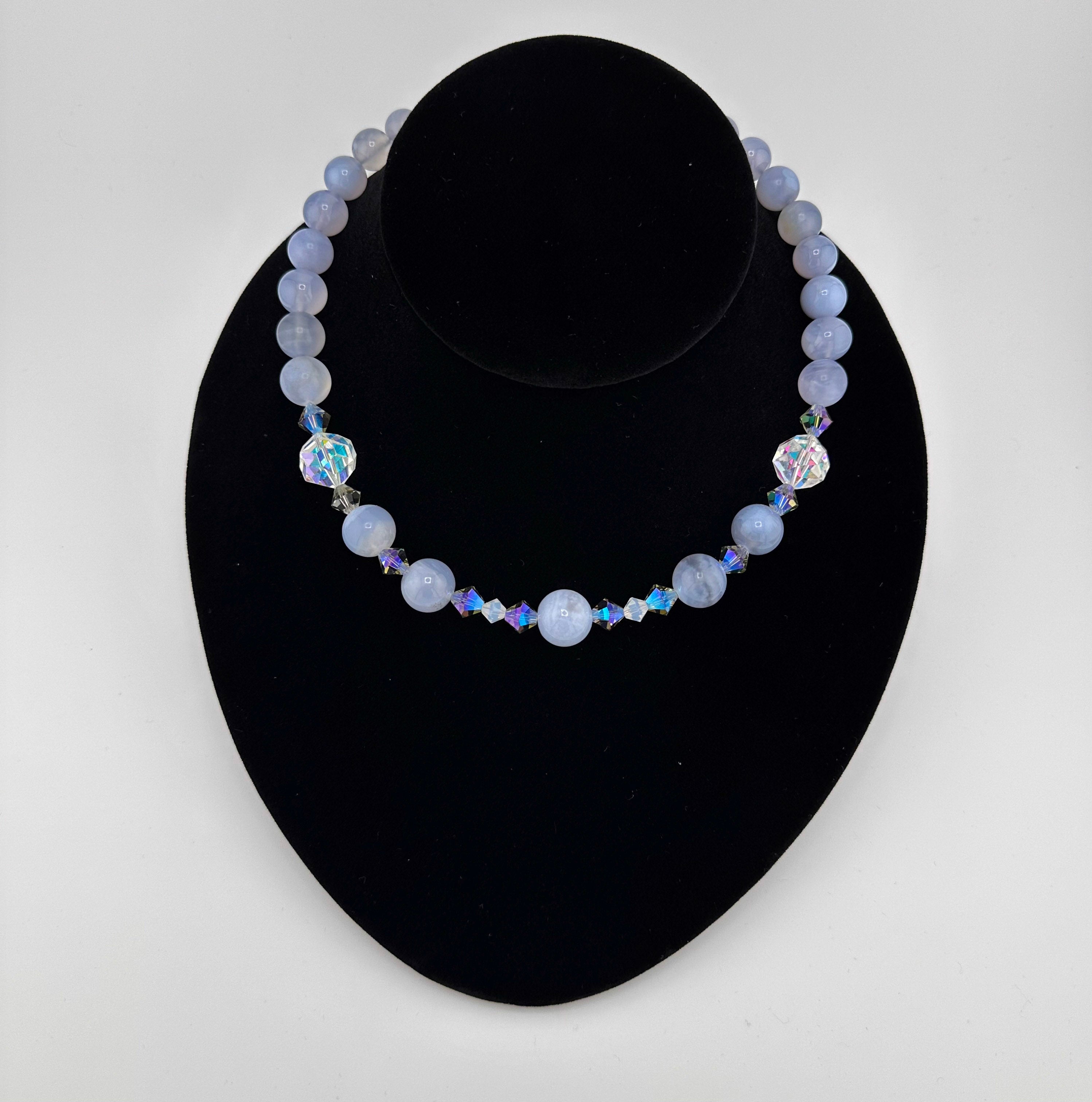 Blue Lace Agate, Swarovski Crystal, and Sterling Silver Necklace on black bust