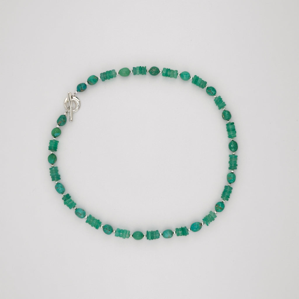 Chrysophrase, Turquoise, Hematite, and Sterling Silver beaded Necklace flatlay on white background