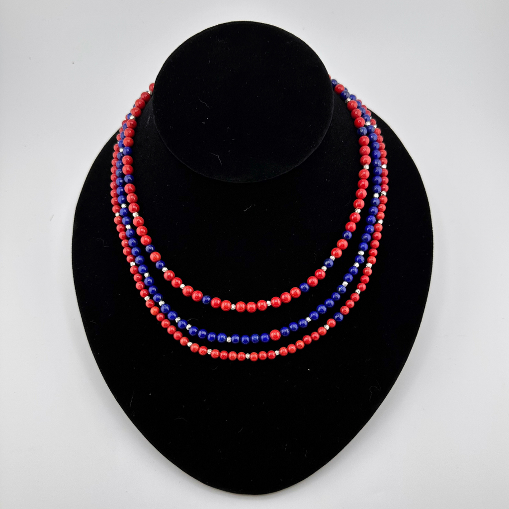 Coral, Lapis, and Sterling Silver 3-Strand Necklace on black bust
