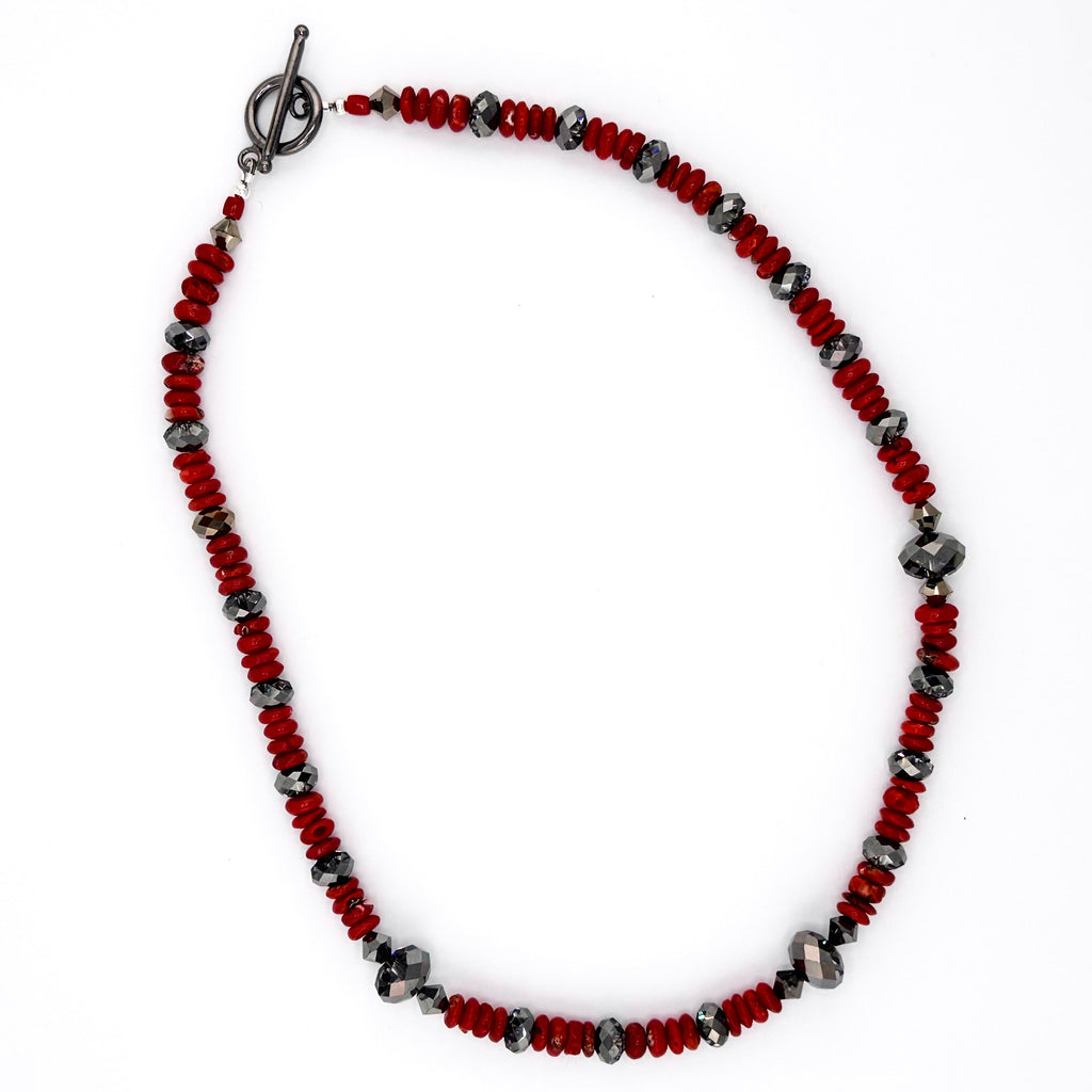 Coral, Swarovski Crystal, and Sterling Silver Necklace flatlay on white background
