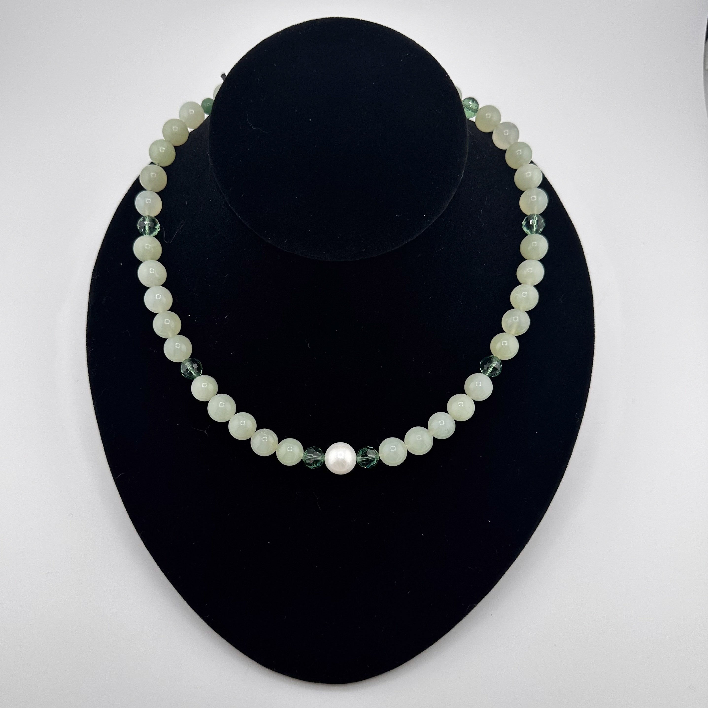 Jade, Pearl, Swarovski Crystal, and Sterling Silver Necklace on black bust