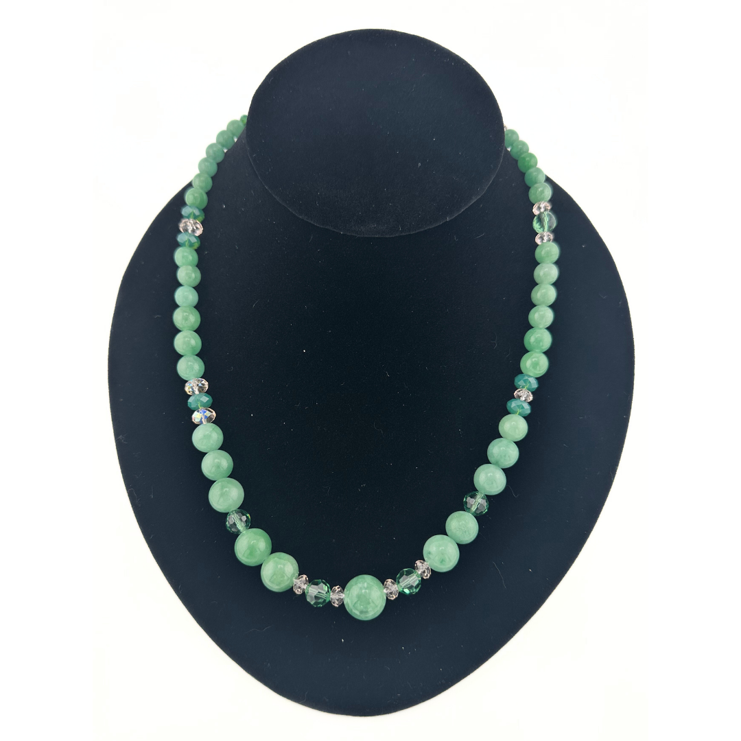 Jade, Swarovski Crystal, and Sterling Silver Necklace on black bust