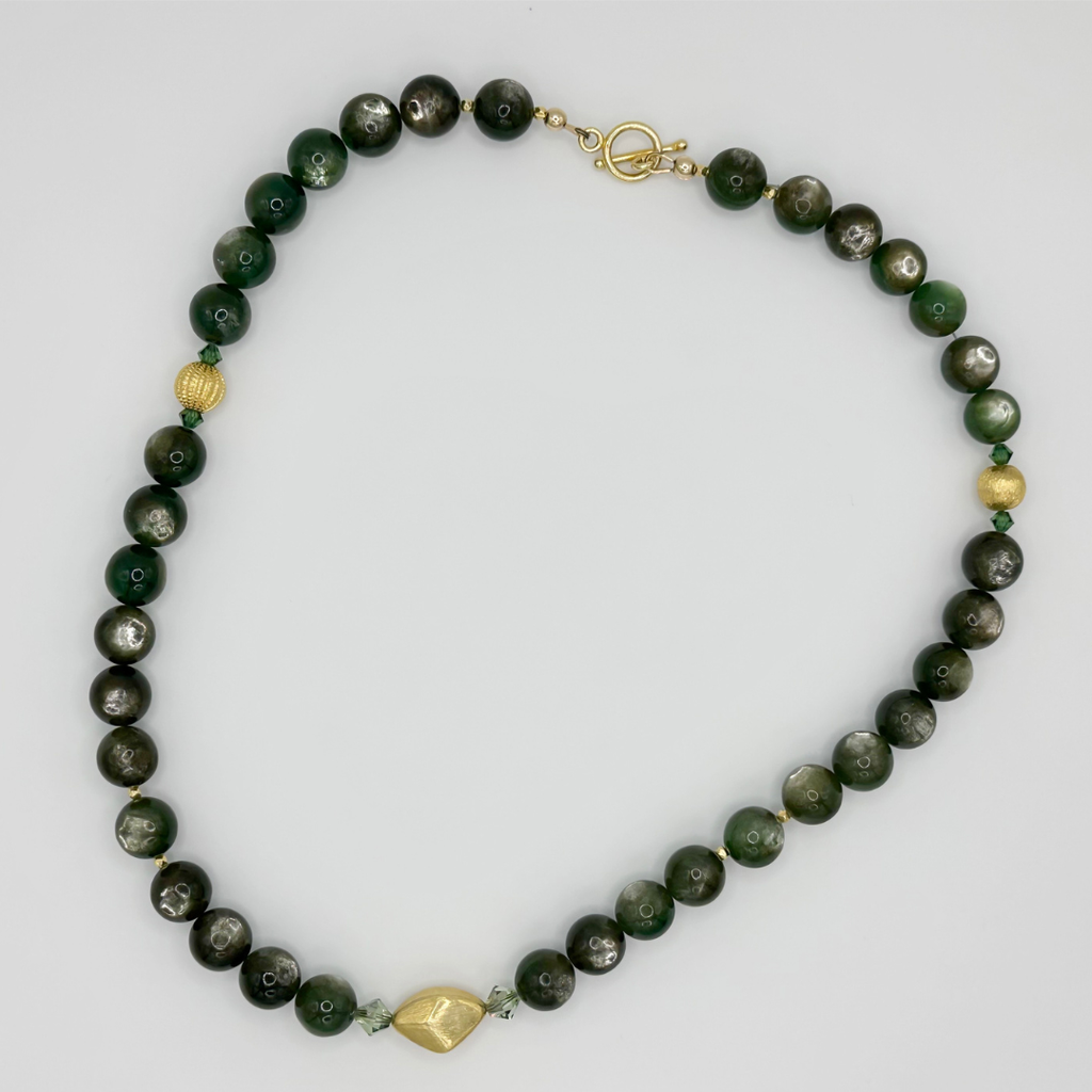 Lepidolite, Swarovski Crystal, and 22K Gold Vermeil beaded Necklace flatlay on white background