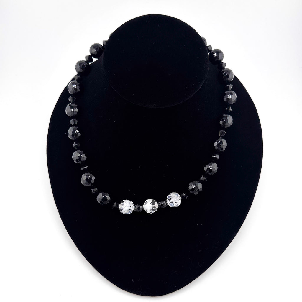 Onyx, Swarovski Crystal, and Sterling Silver Necklace on black bust