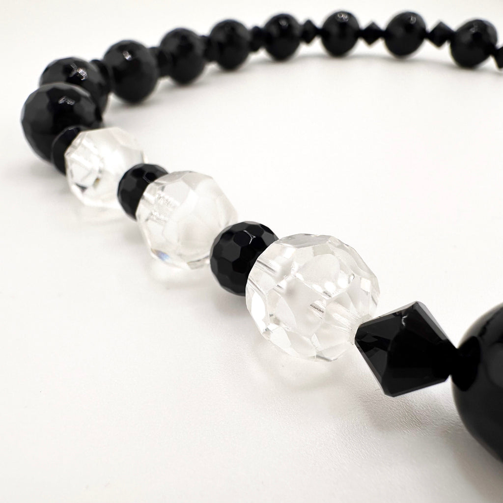 Onyx, Swarovski Crystal, and Sterling Silver Necklace closeup on white background