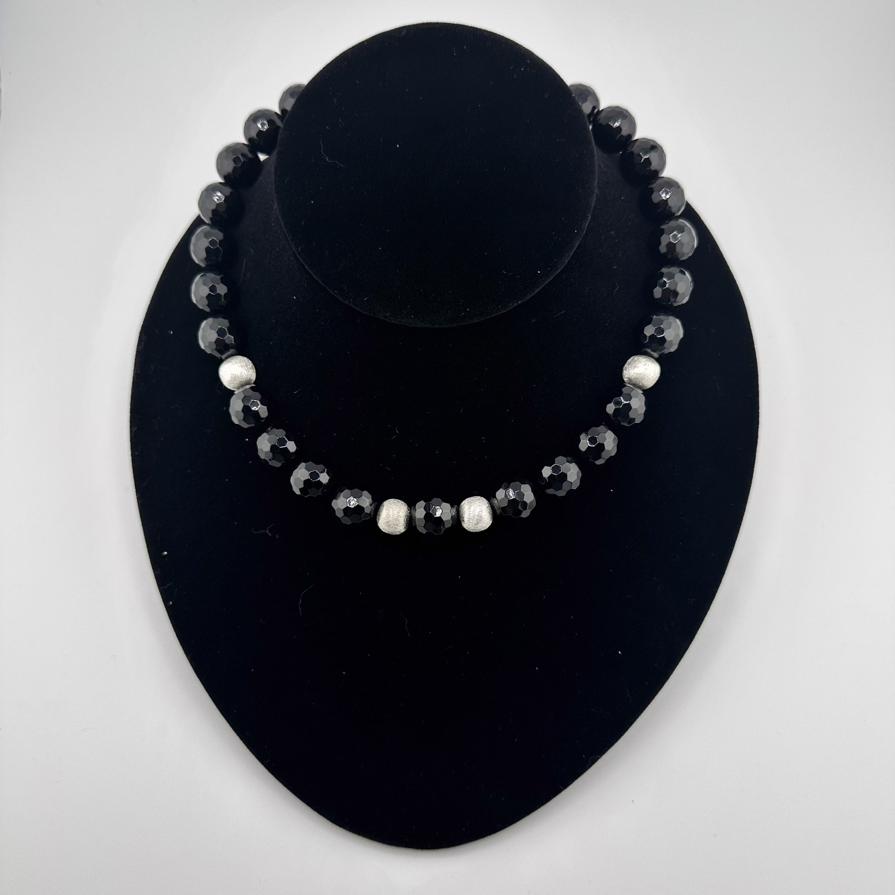 Onyx and Sterling Silver Necklace on black bust