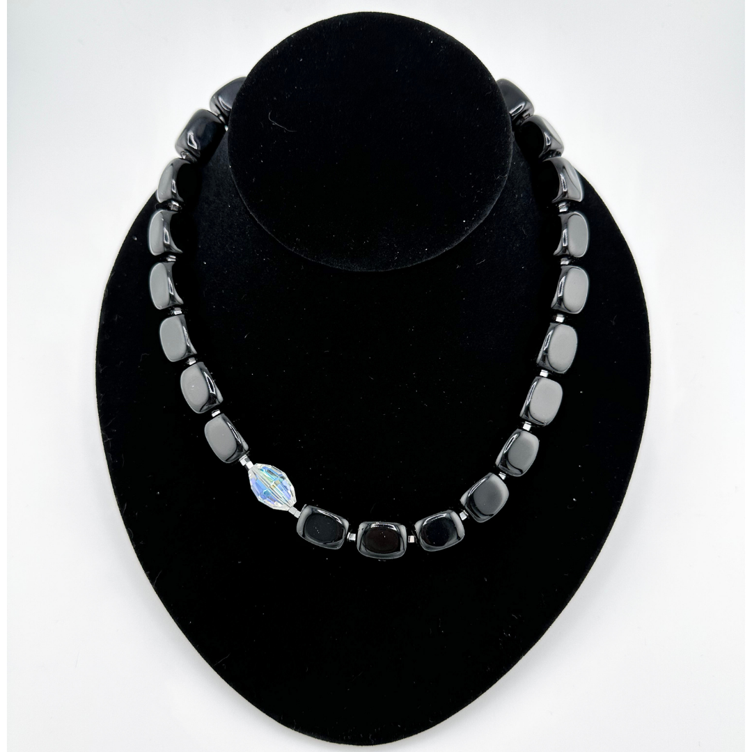 Onyx, Hematite, Swarovski Crystal, and Sterling Silver Necklace on black bust