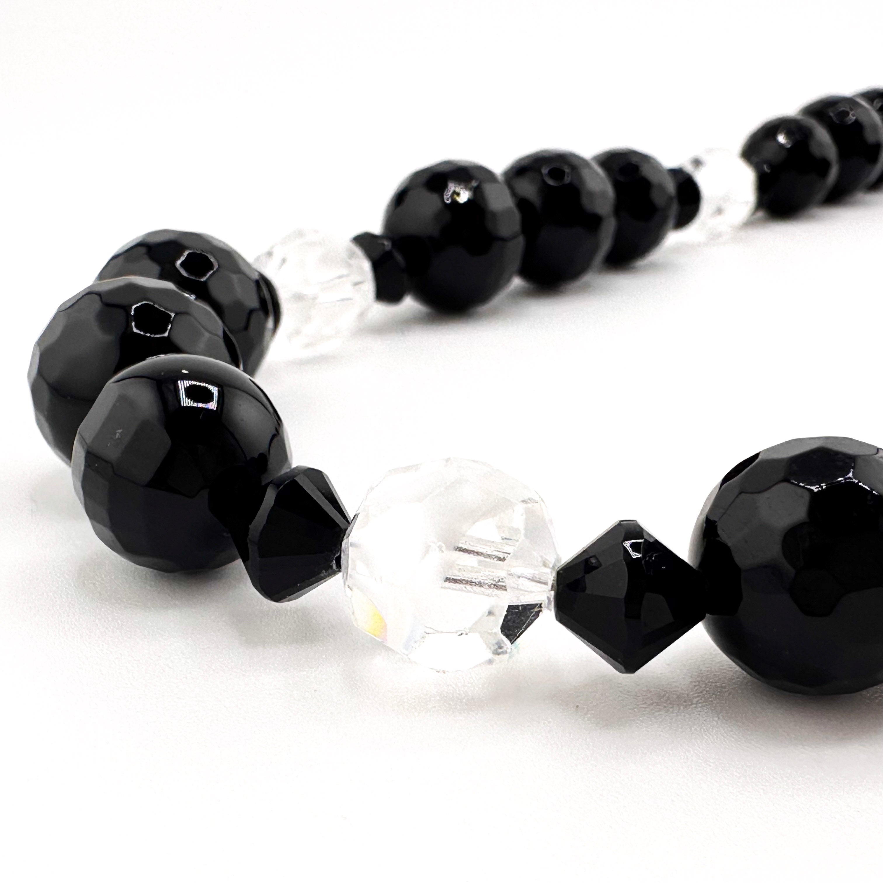 Onyx, Swarovski Crystal, and Sterling Silver Necklace closeup on white background