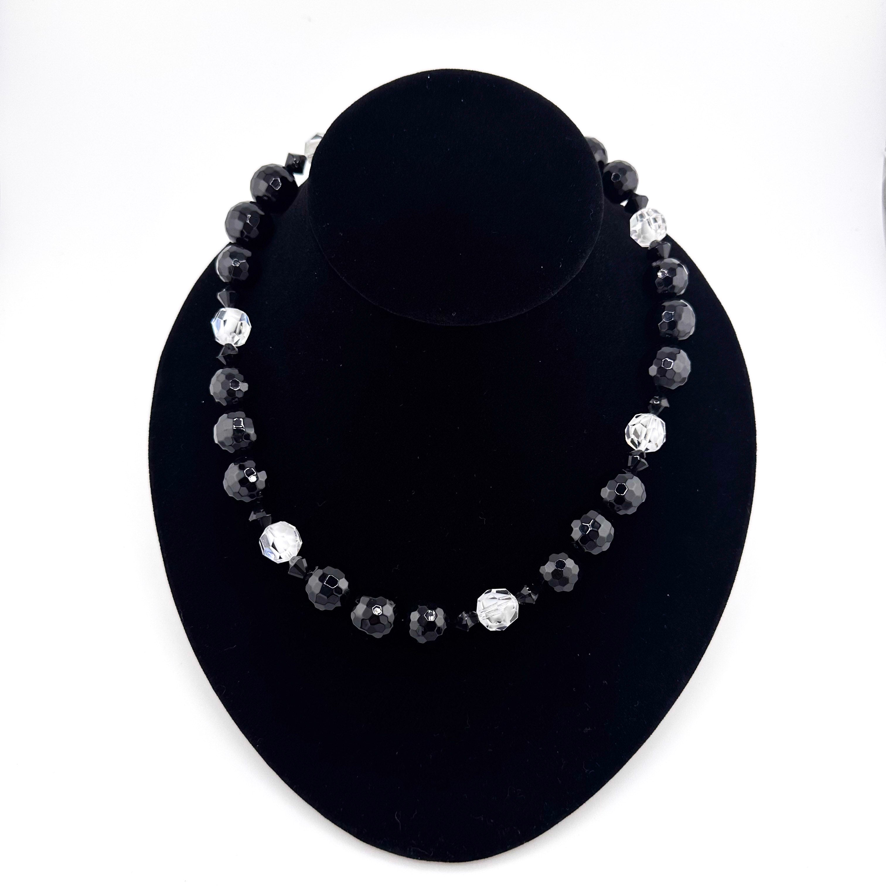 Onyx, Swarovski Crystal, and Sterling Silver Necklace on black bust