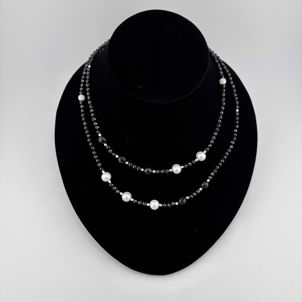 Pearl, Spinel, Onyx, and Sterling Silver Necklace on black bust