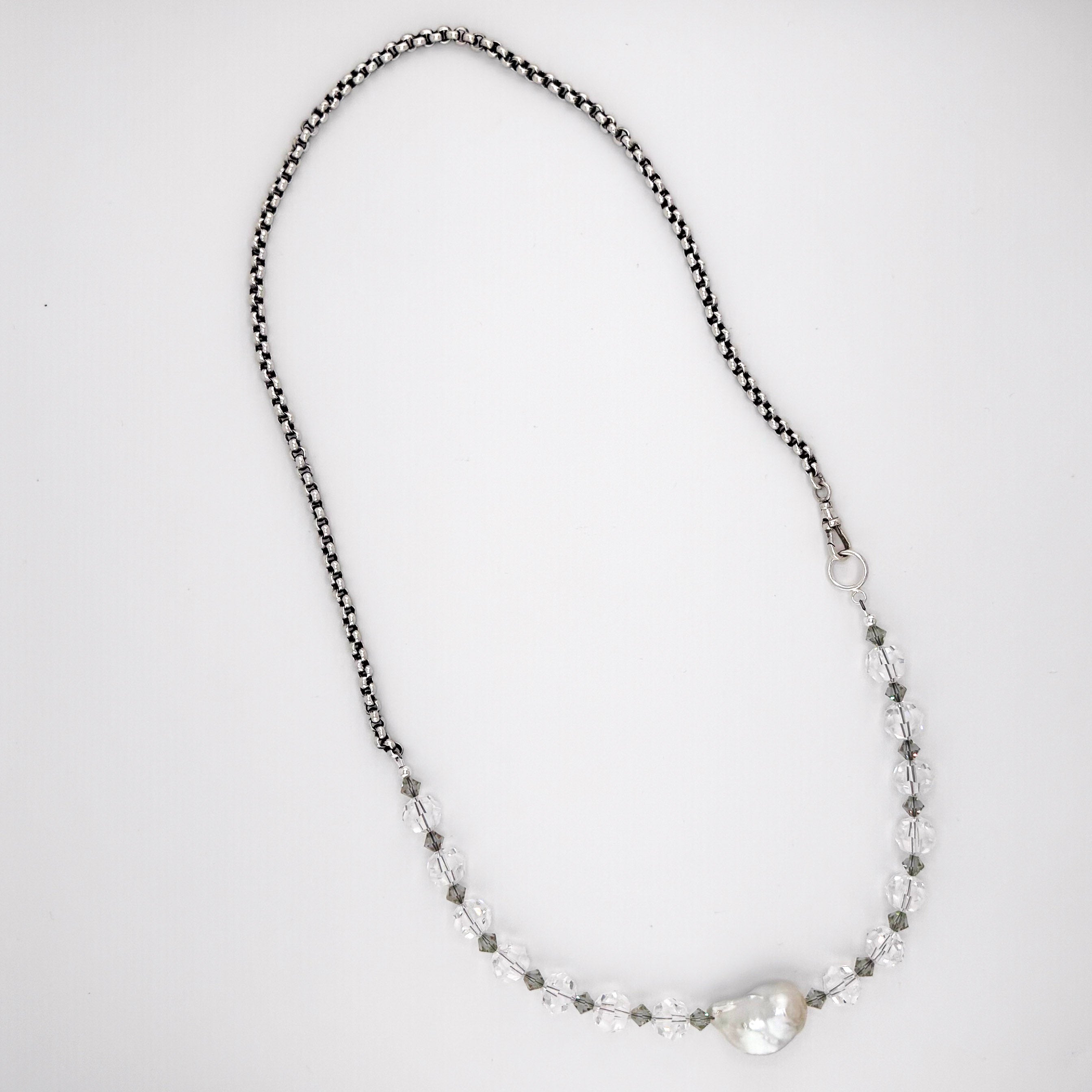 Pearl, Swarovski Crystal, and Sterling Silver Watch Chain Necklace flatlay on white background