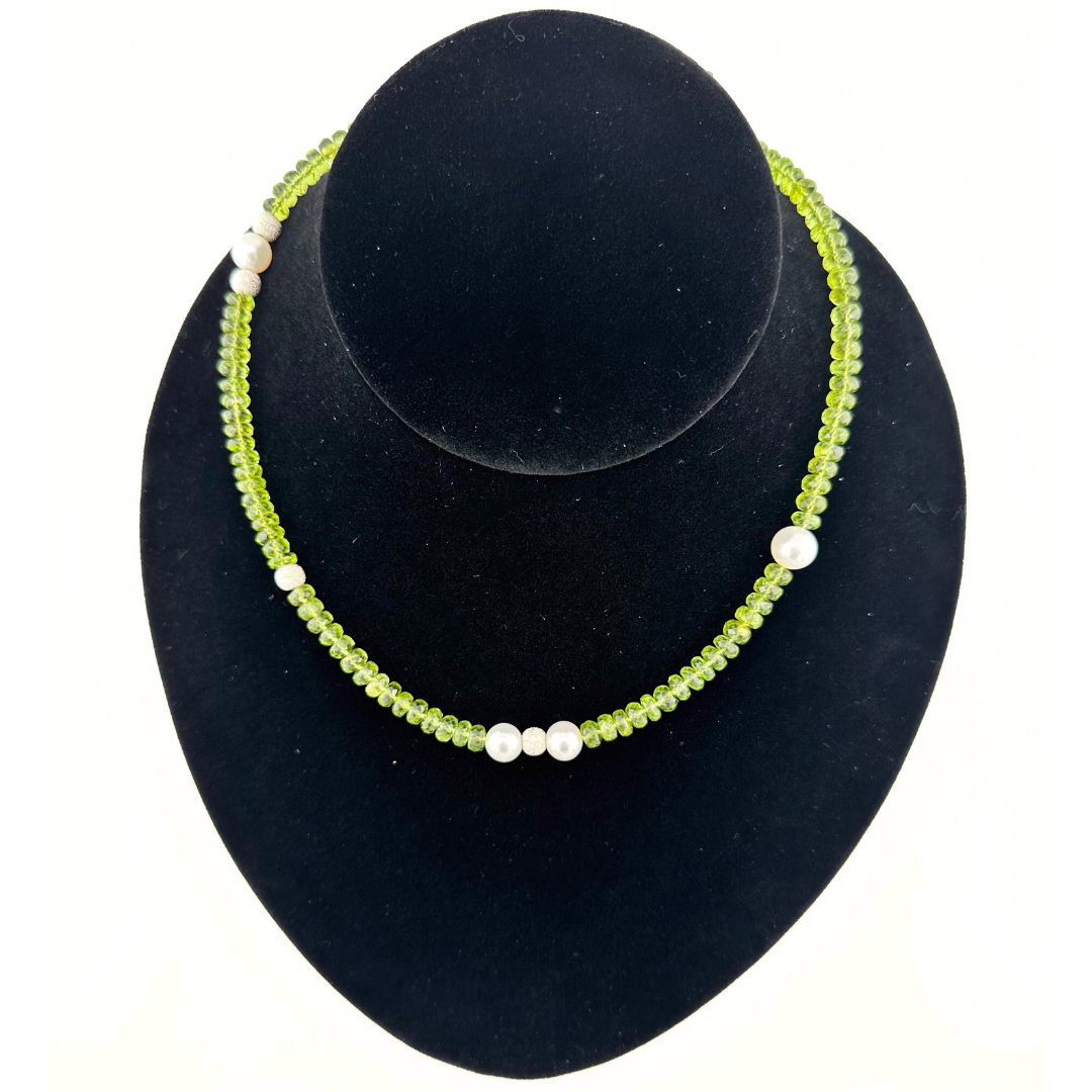 Peridot, Pearl, and Sterling Silver Necklace on black bust