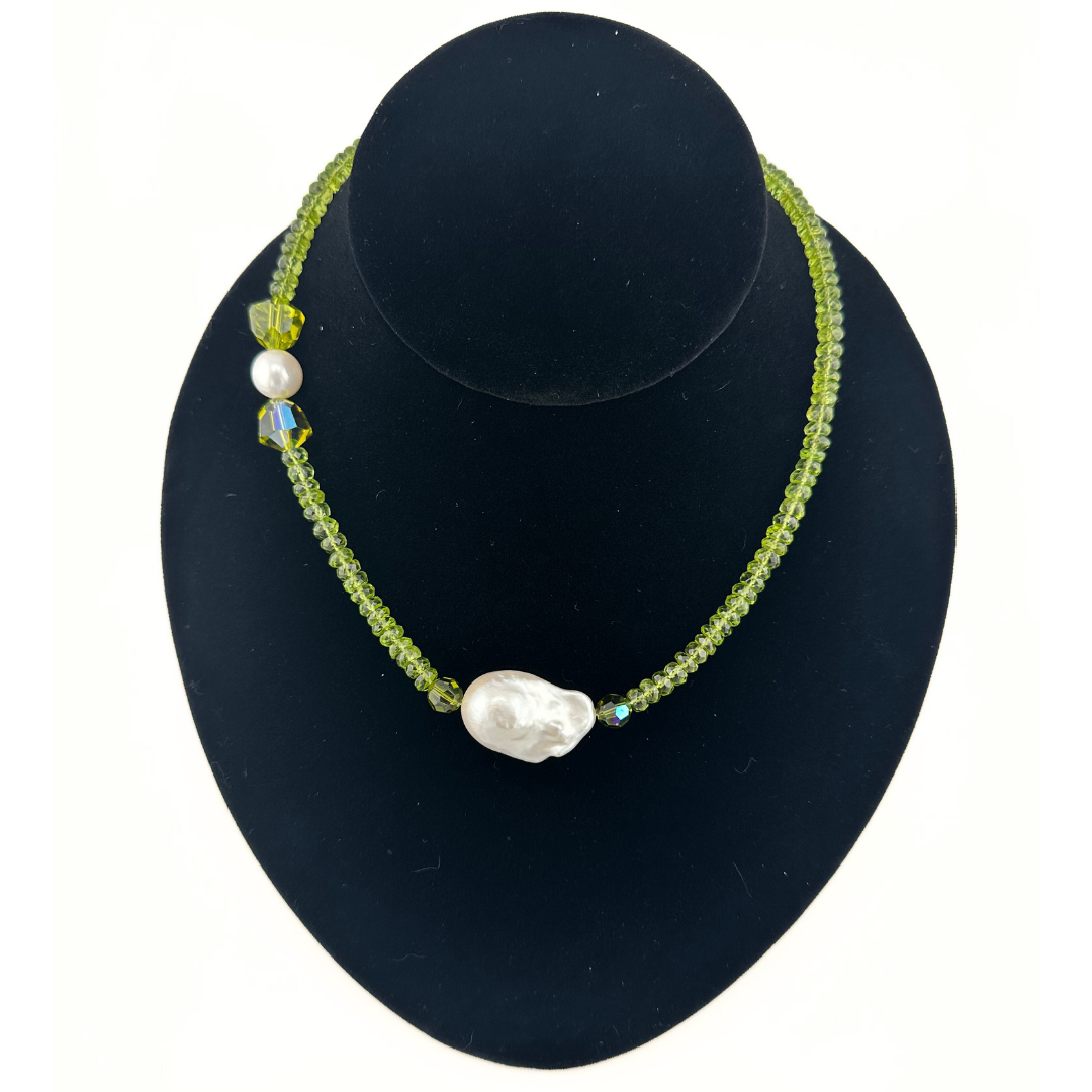 Peridot, Pearl, Swarovski Crystal, and Sterling Silver Necklace on black bust