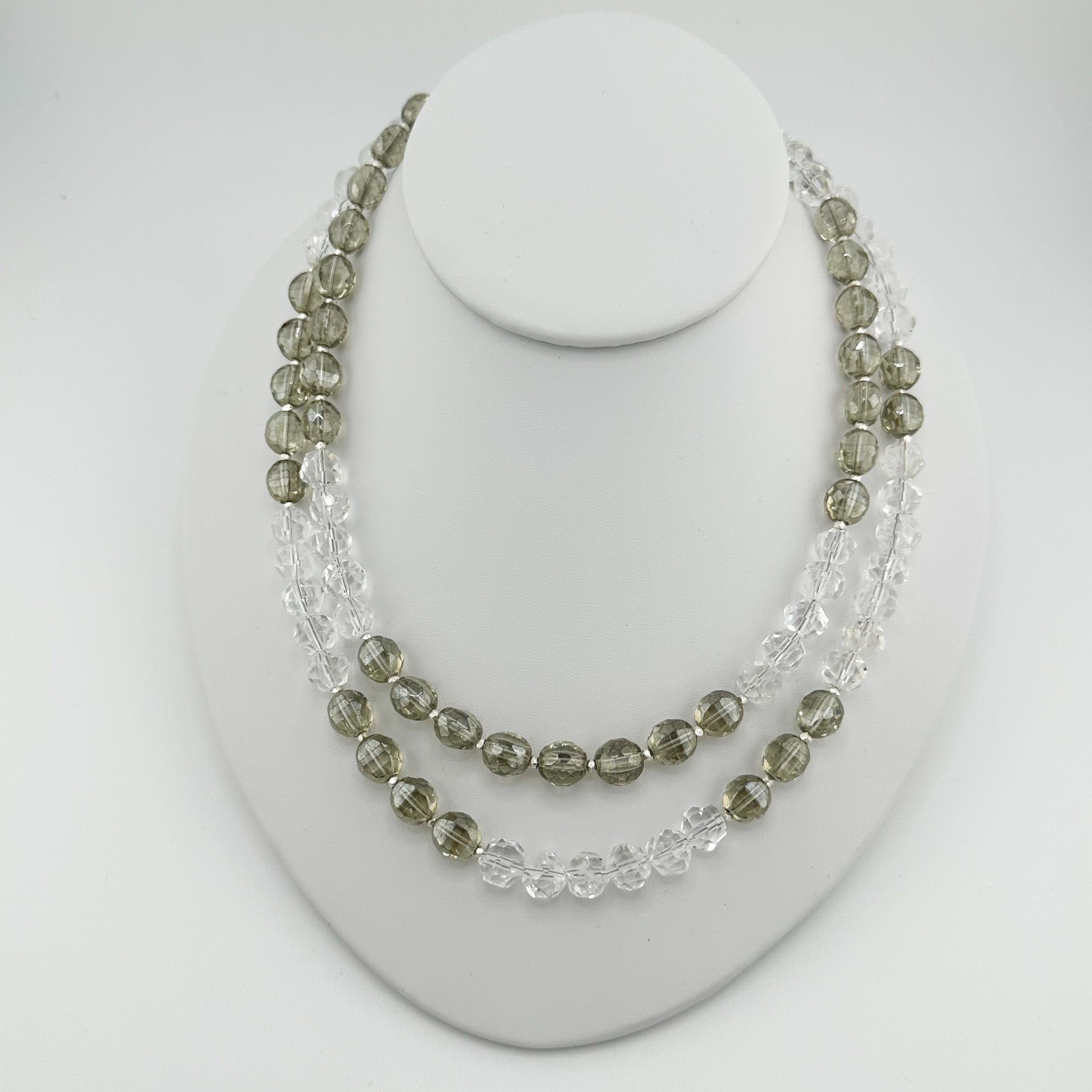 Quartz, Crystal, and Sterling Silver Necklace on white bust