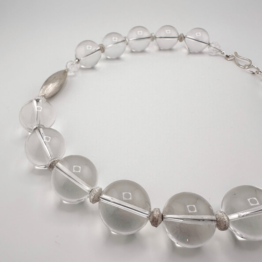 Quartz and Sterling Silver Necklace closeup on white background
