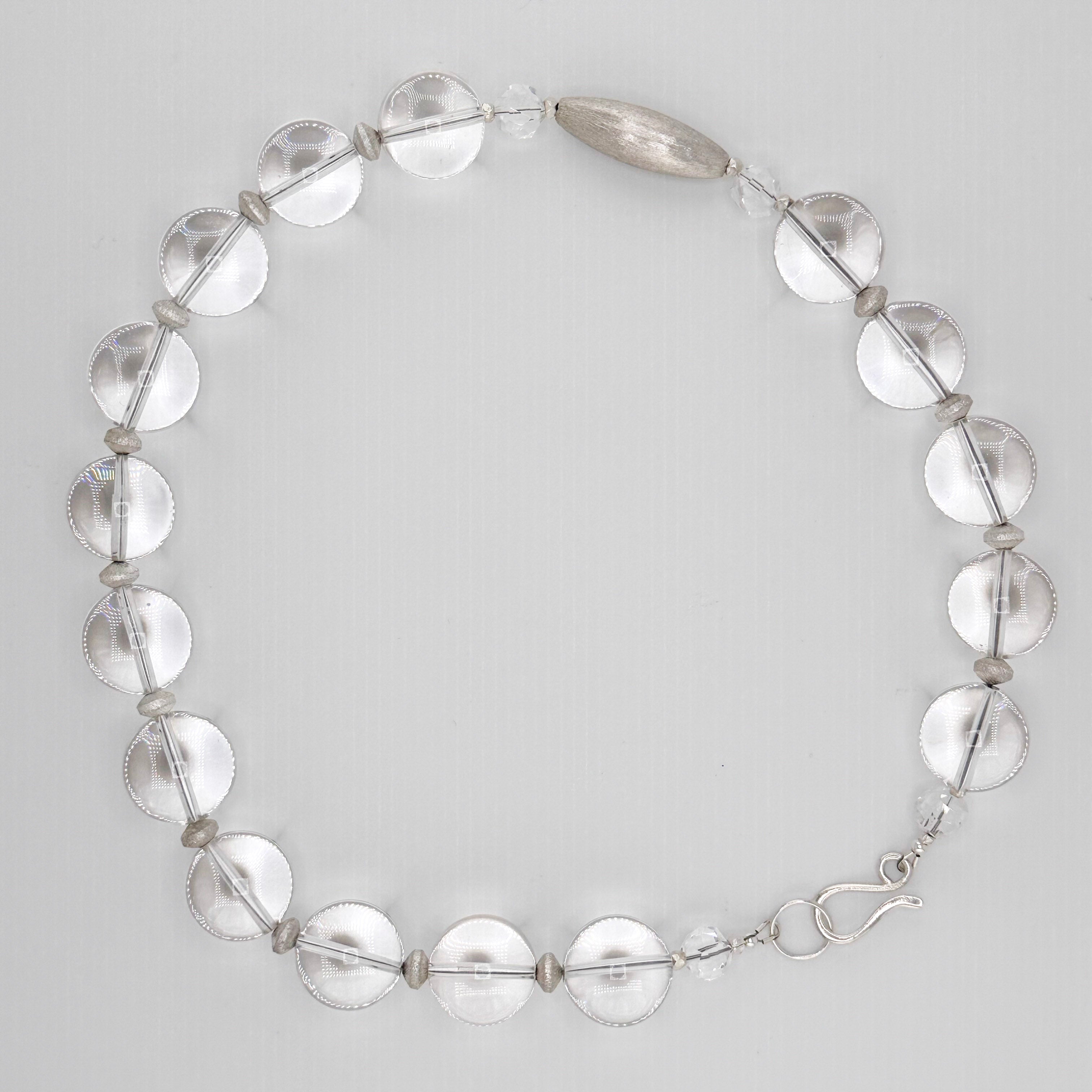 Quartz and Sterling Silver Necklace flatlay on white background