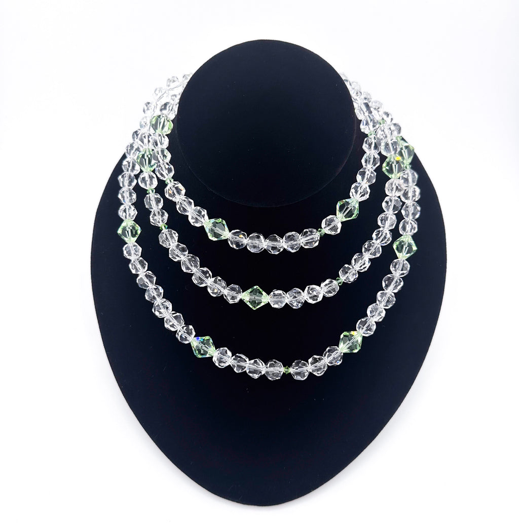 Quartz, Swarovski Crystal, and Sterling Silver Necklace on black bust