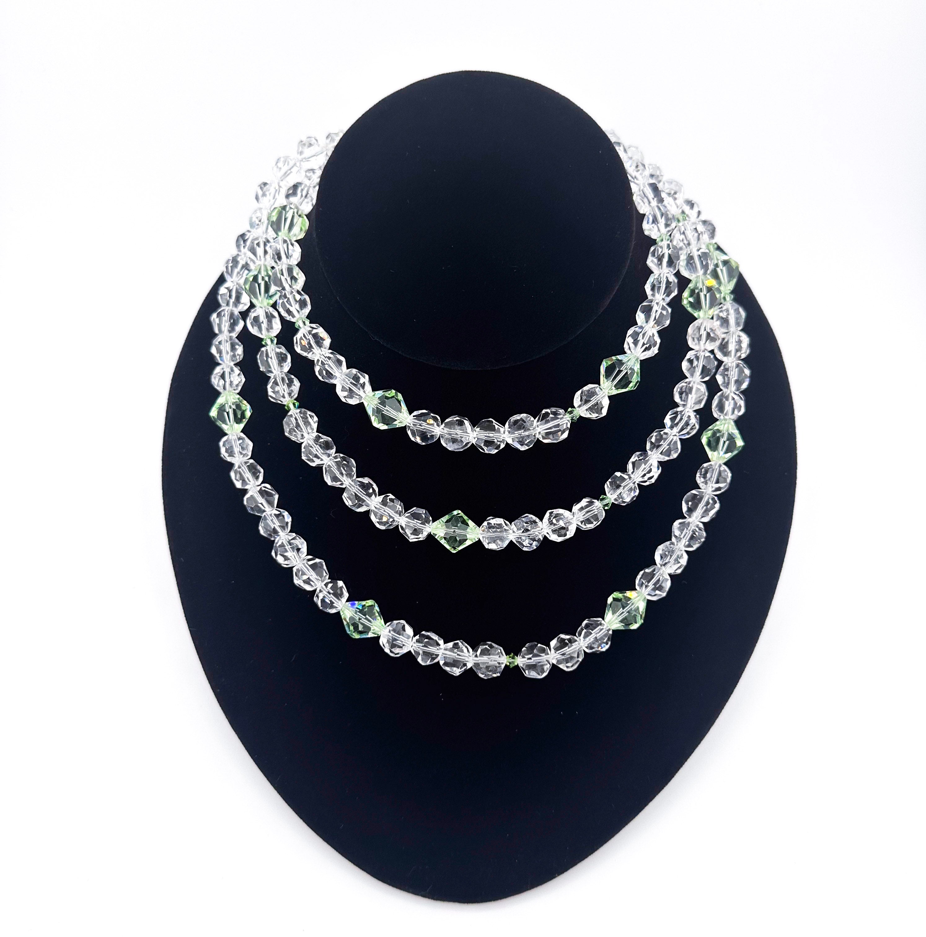 Quartz, Swarovski Crystal, and Sterling Silver Necklace on black bust