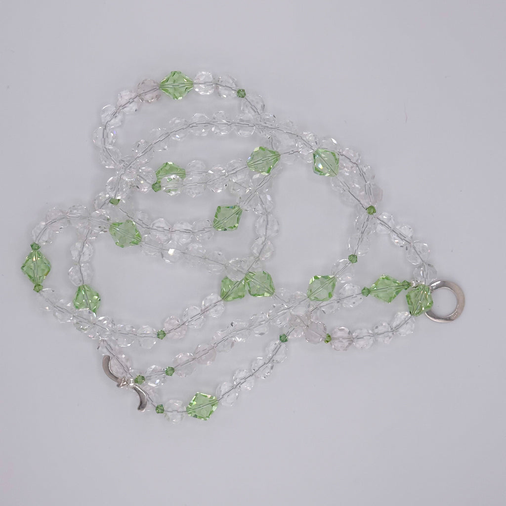Quartz, Swarovski Crystal, and Sterling Silver Necklace on white background