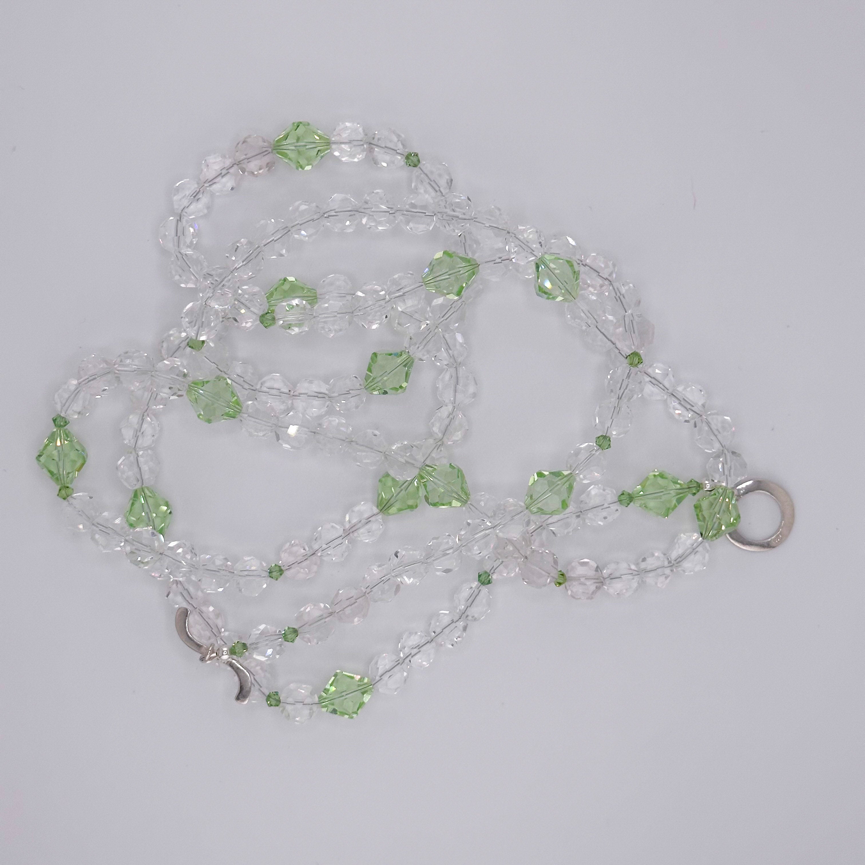 Quartz, Swarovski Crystal, and Sterling Silver Necklace on white background
