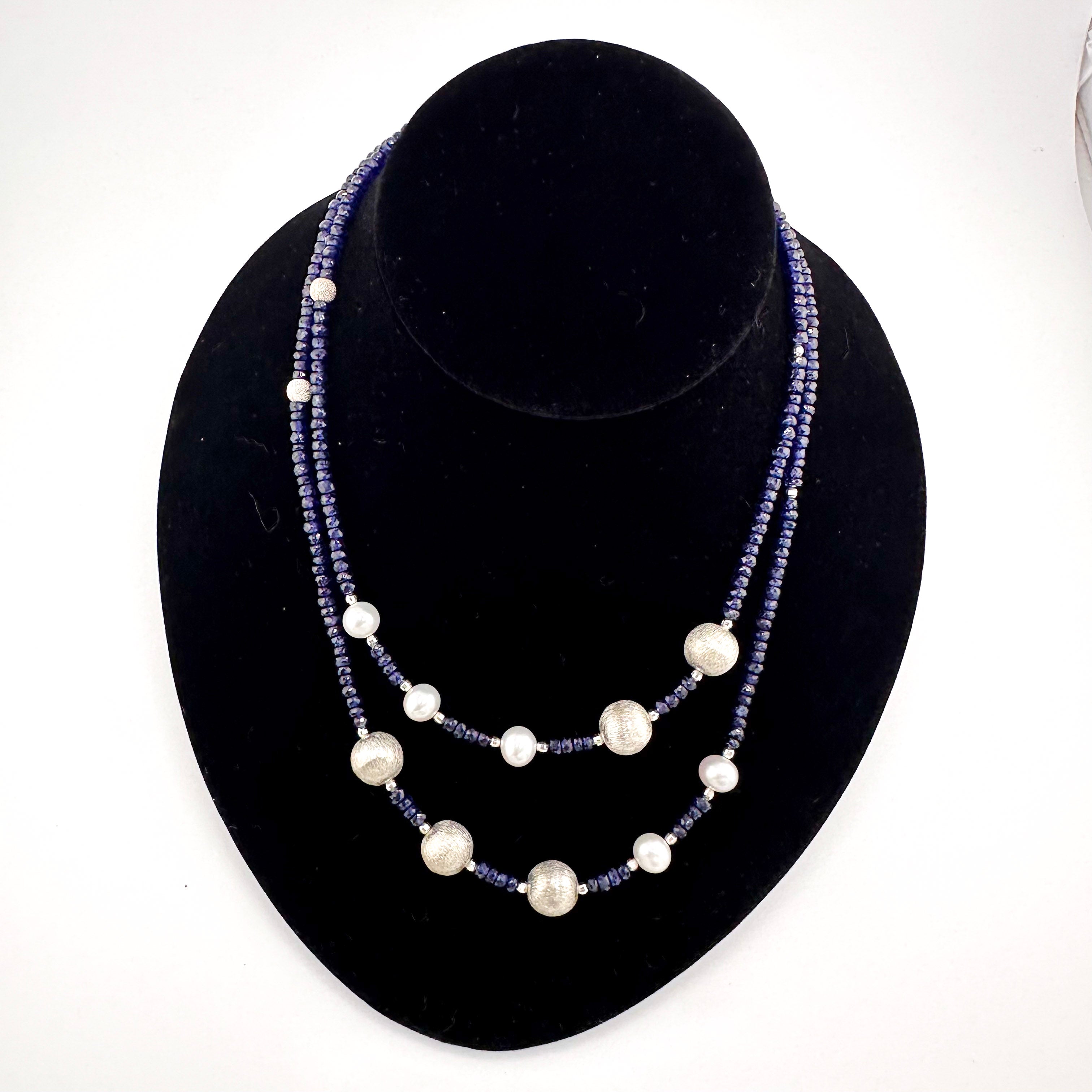 Sapphire, Pearl, and Sterling Silver Necklace on black bust