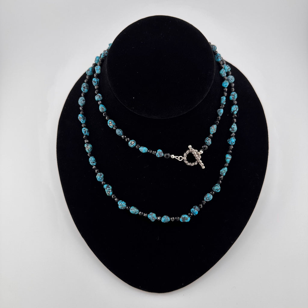 Turquoise, Spinel, Onyx, and Sterling Silver Necklace on black bust