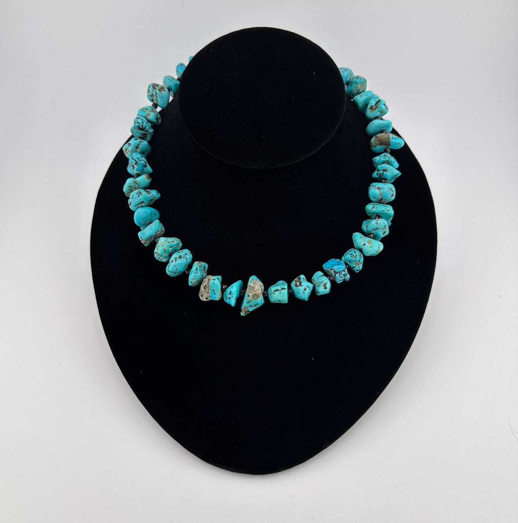 Turquoise, Spinel, Quartz, and Sterling Silver Necklace on black bust