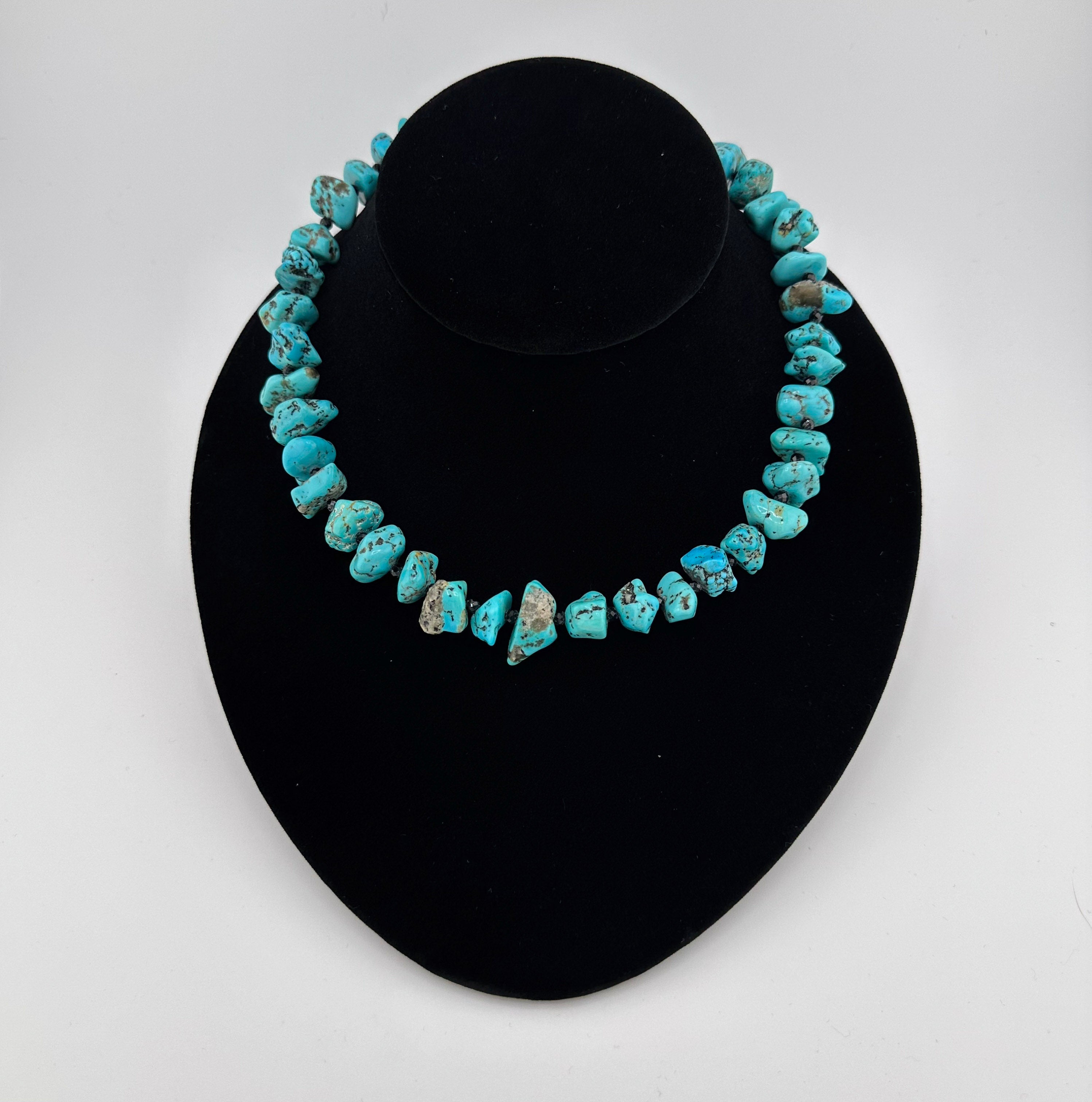 Turquoise, Spinel, Quartz, and Sterling Silver Necklace on black bust