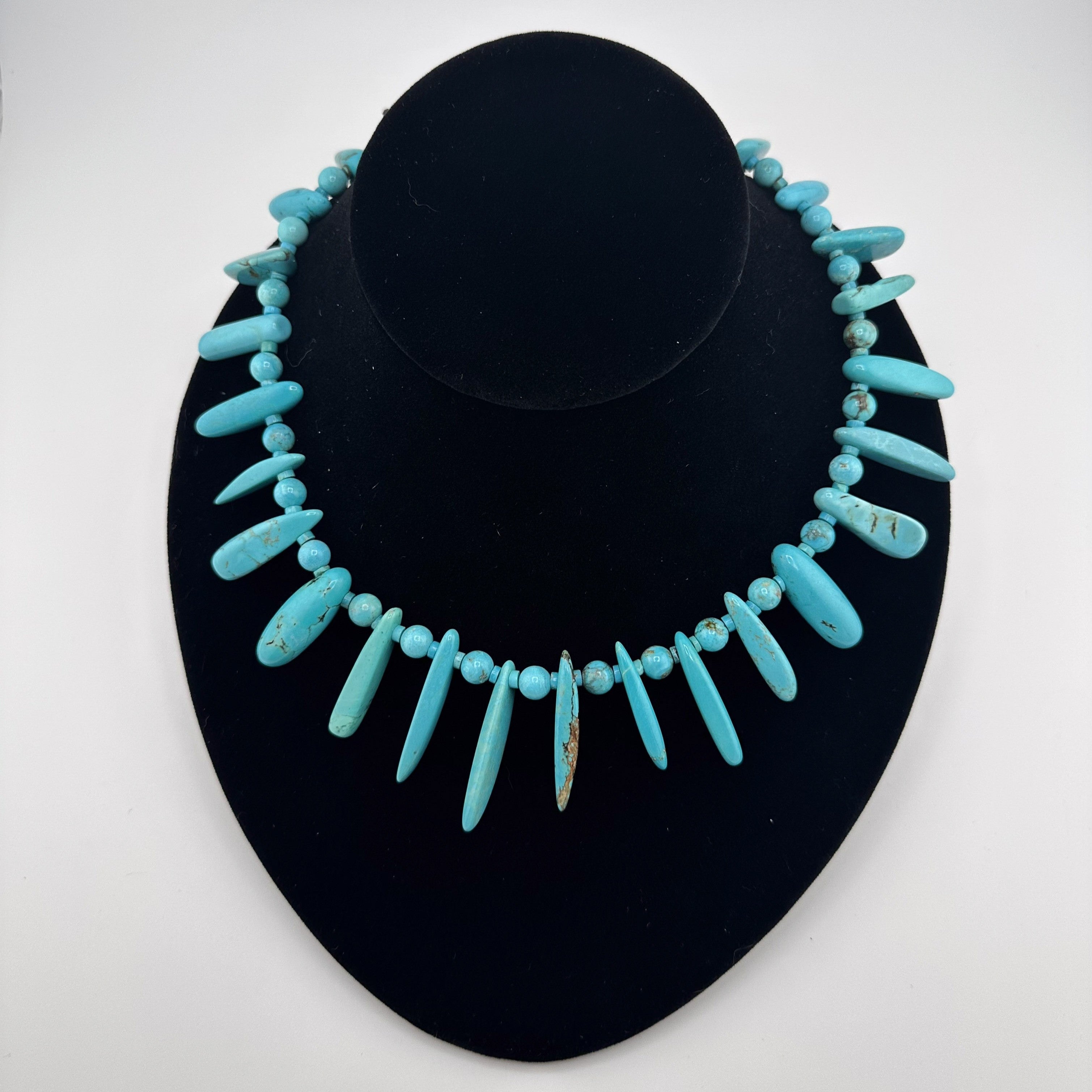 Turquoise and Sterling Silver Necklace on black bust
