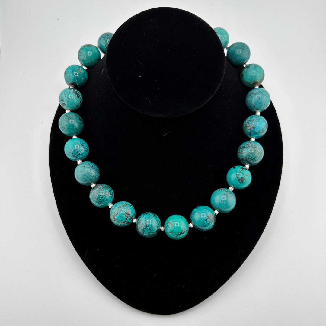 Turquoise, Onyx, and Sterling Silver Necklace on black bust