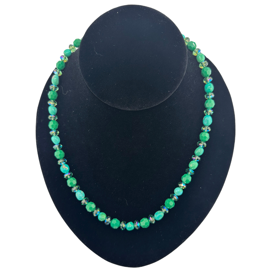Turquoise, Swarovski Crystal, and Sterling Silver Necklace on black bust