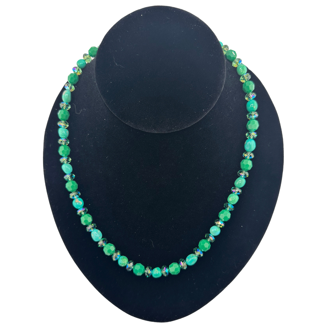 Turquoise, Swarovski Crystal, and Sterling Silver Necklace on black bust