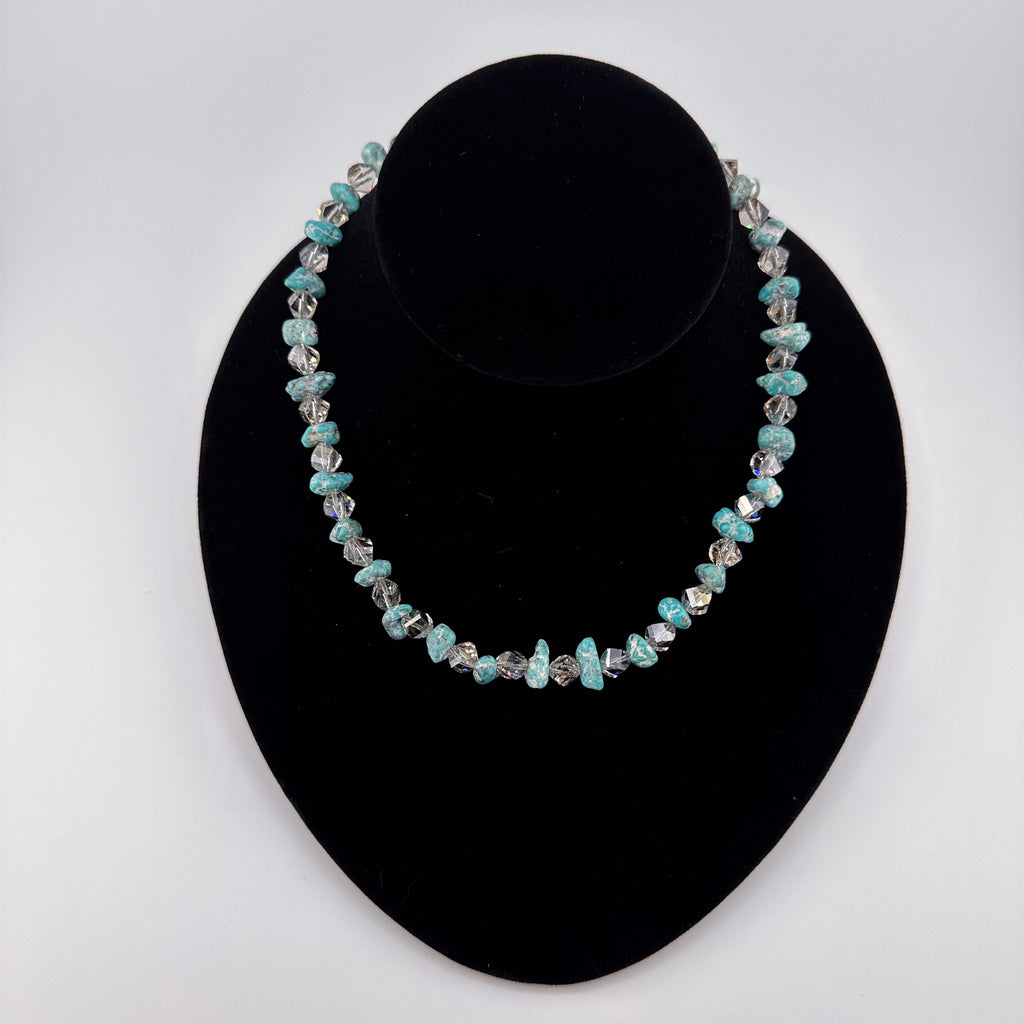 Turquoise, Quartz, Swarovski Crystal, Hematite, and Sterling Silver Necklace on black bust