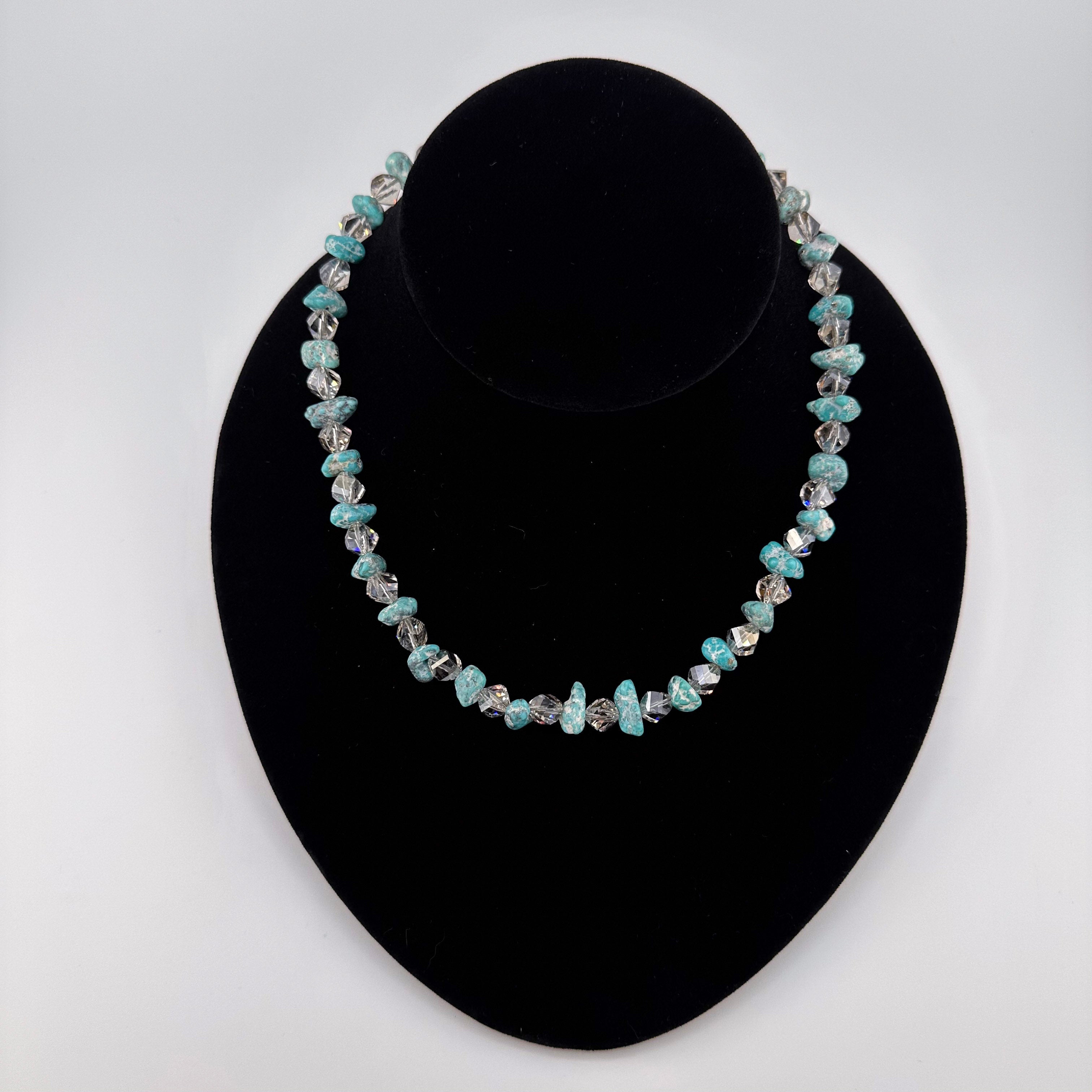 Turquoise, Quartz, Swarovski Crystal, Hematite, and Sterling Silver Necklace on black bust
