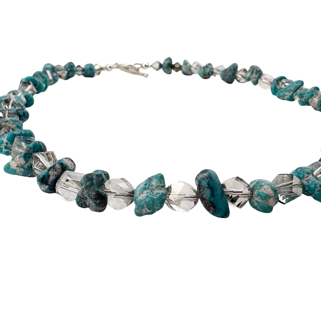 Turquoise, Quartz, Swarovski Crystal, Hematite, and Sterling Silver Necklace close-up on white background