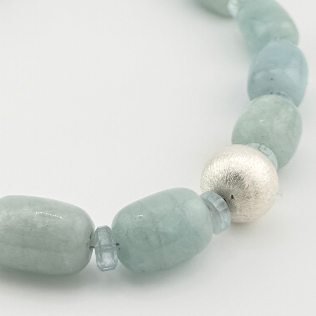Aquamarine and Sterling Silver Necklace close-up on white background