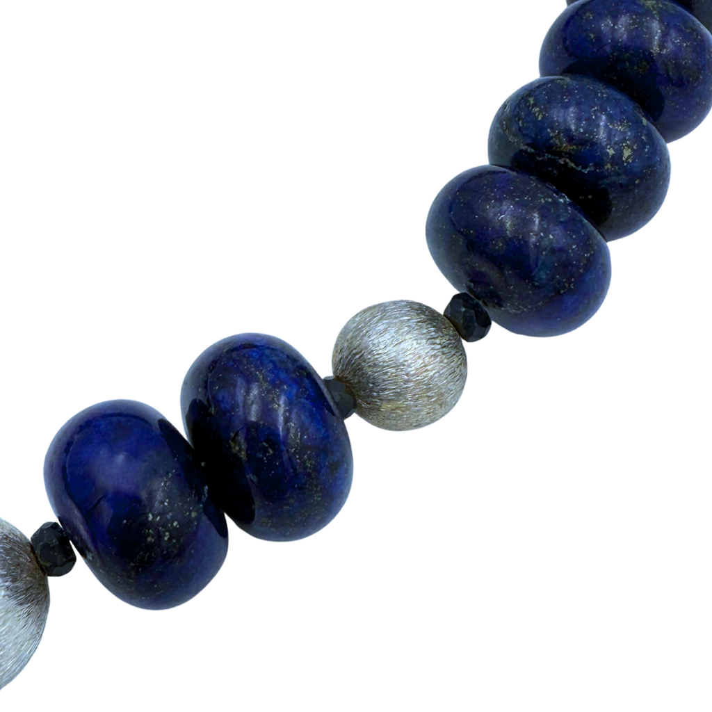 Lapis, Sapphire, and Sterling Silver Necklace closeup on white background
