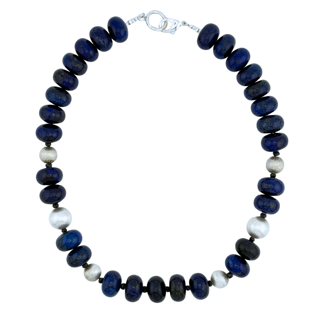 Lapis, Sapphire, and Sterling Silver Necklace flatlay on white background